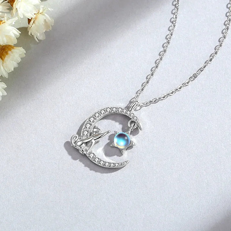 Close-up of the pendant and clasp on the Cat and Moon Necklace