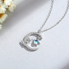 Close-up of the pendant and clasp on the Cat and Moon Necklace