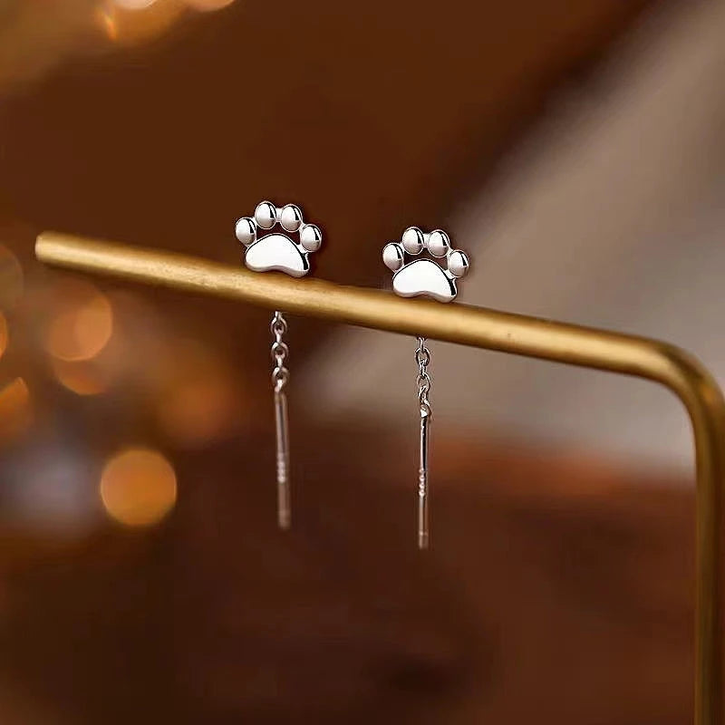 Angled view of the Sterling Silver Cat Claw Threader Earrings