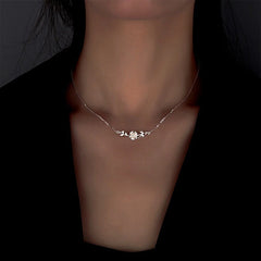 Close-up of the pendant and clasp on the Cherry Blossom Necklace