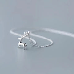 Sterling Silver Christmas Elk Pendant Necklace worn to showcase its length and pendant detail