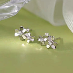 Angled view of the Sterling Silver Clover Stud Earrings