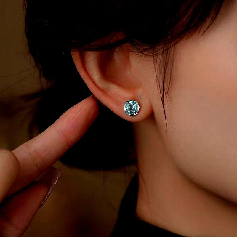 Model showcasing the dangle and style of the Sterling Silver Colorful Diamond Stud Earrings