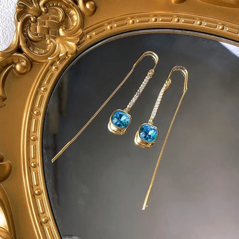 Close-up detail of the sparkling zircons and plating on the Crystal Threader Earrings