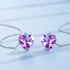 Angled view of the Sterling Silver Crystal Heart Threader Earrings