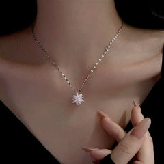 Close-up of the pendant and clasp on the Ice Flower Necklace