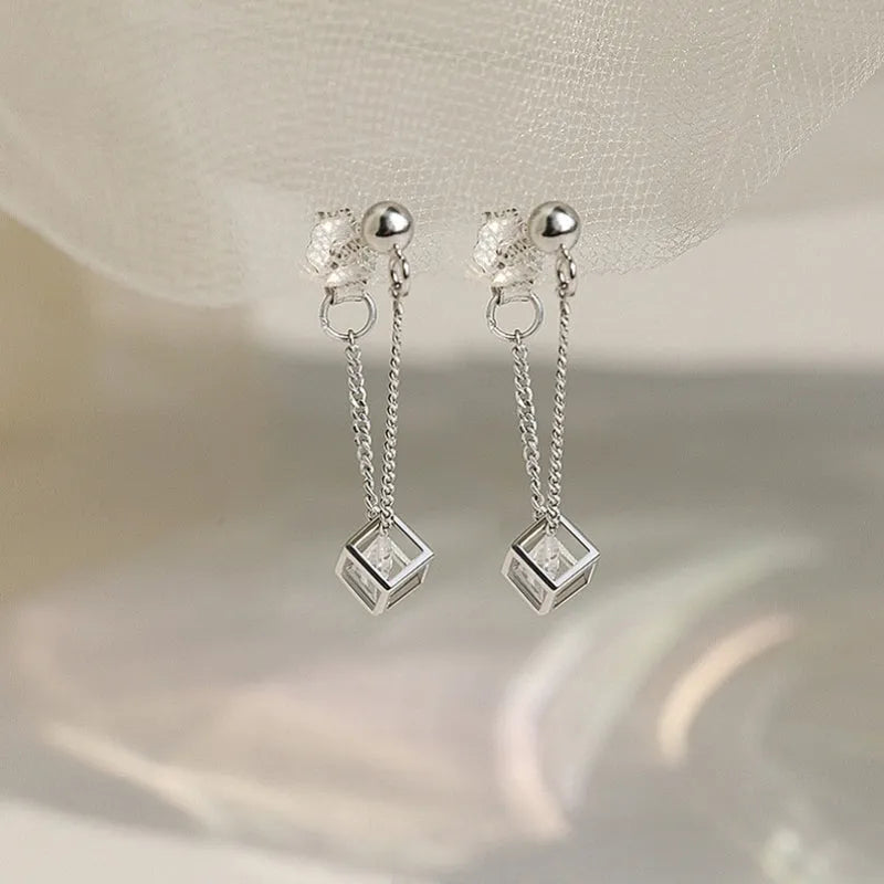 Close-up detail of the sparkling zircons and plating on the Cube Diamond Earrings