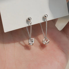 Angled view of the Sterling Silver Cube Diamond Zircon Earrings