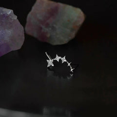 Close-up detail of the sparkling zircons and plating on the Star Crawler Earrings