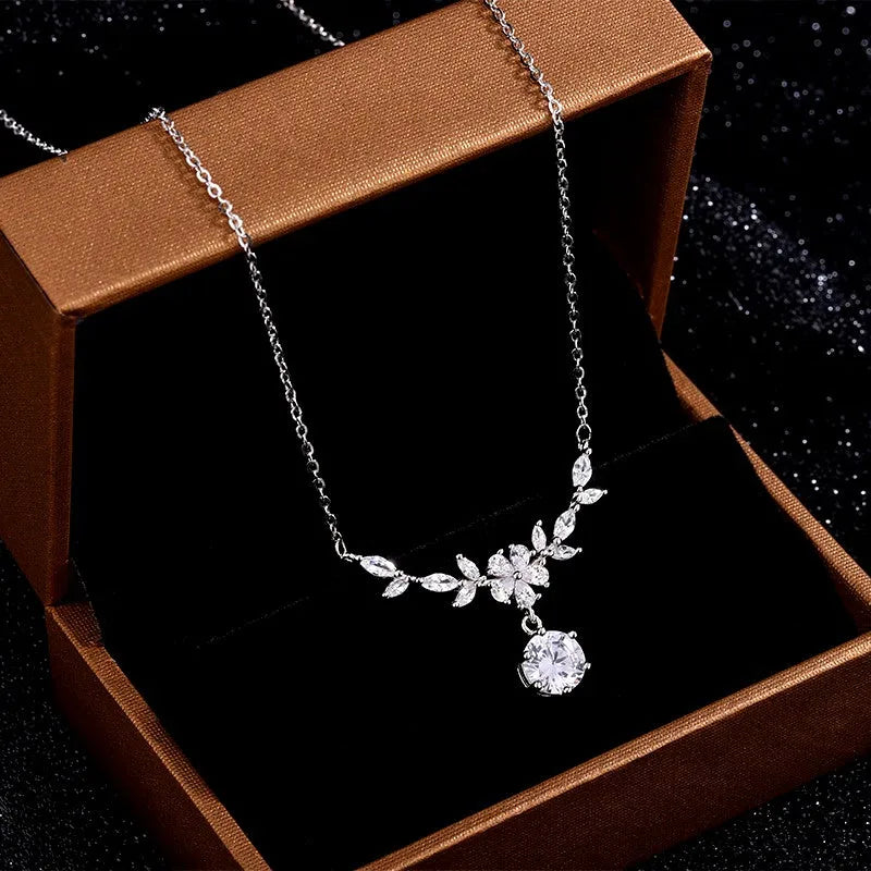 Detailed view of the Sterling Silver Diamond Cherry Blossom Necklace chain and pendant