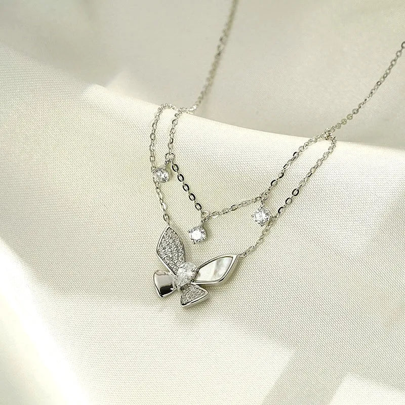 Close-up of the pendant and clasp on the Double-Layer Butterfly Necklace