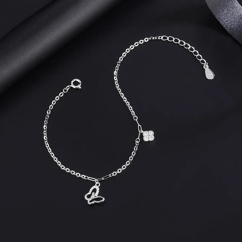 Close-up of the clasp and charm details on the Wishing Tree Necklace