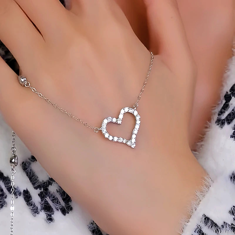 Detailed view of the Sterling Silver Diamond Hollow Heart Necklaces chain and pendant