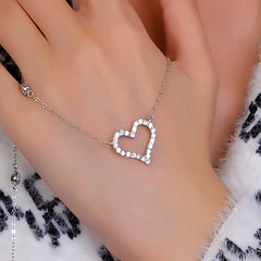 Detailed view of the Sterling Silver Diamond Hollow Heart Necklaces chain and pendant