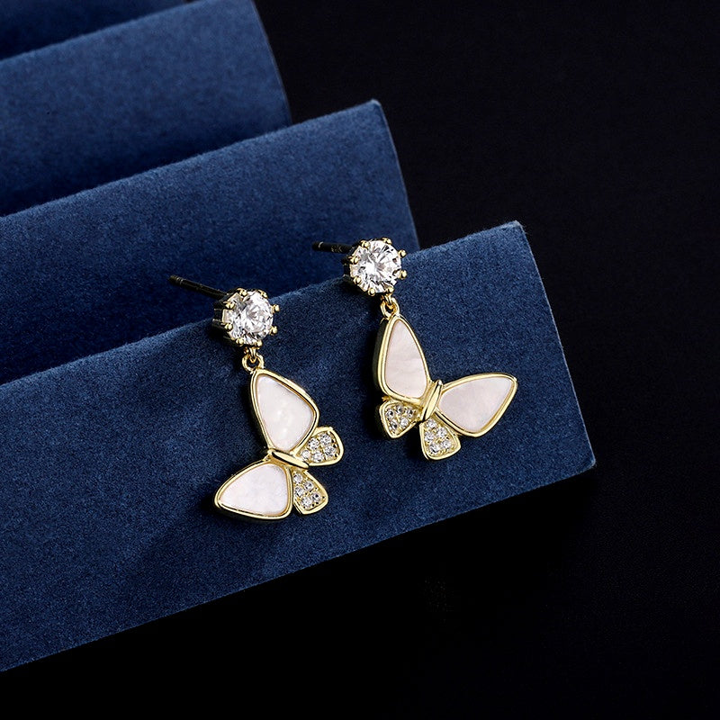 Close-up detail of the sparkling zircons and plating on the Hollow Heart Necklace