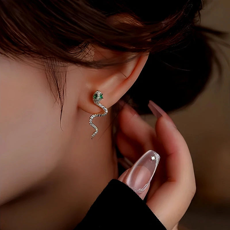 Model showcasing the dangle and style of the Sterling Silver Diamond Snake Earrings