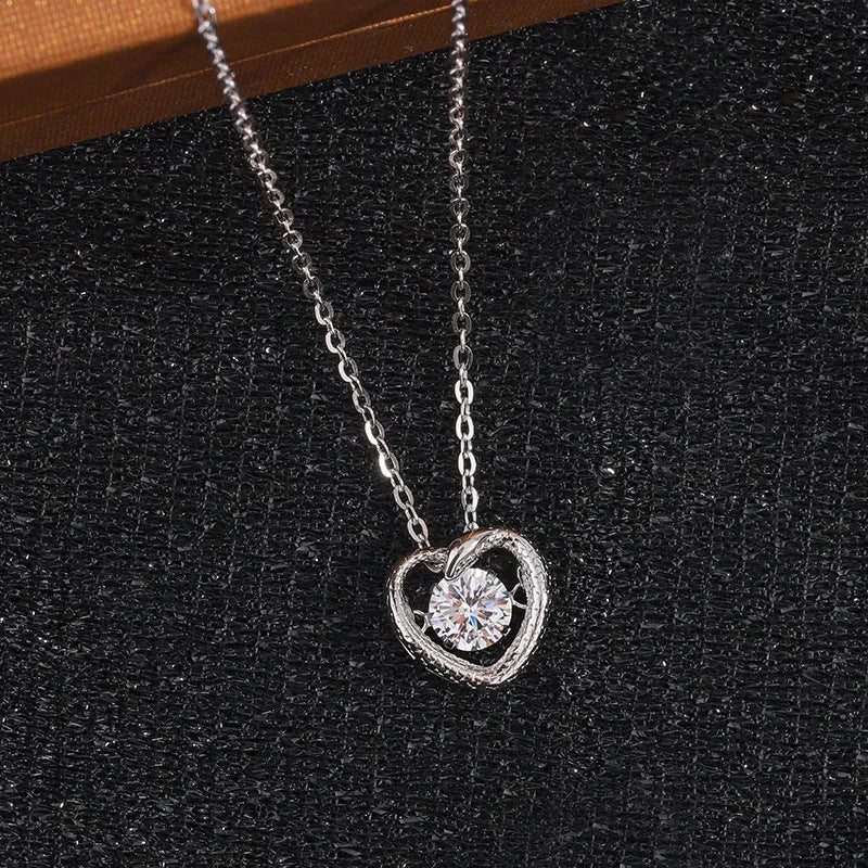 Close-up of the pendant and clasp on the Key Flower Necklace