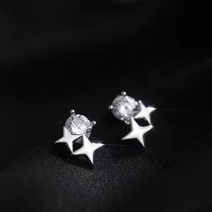 Angled view of the Sterling Silver Diamond Star Stud Earrings