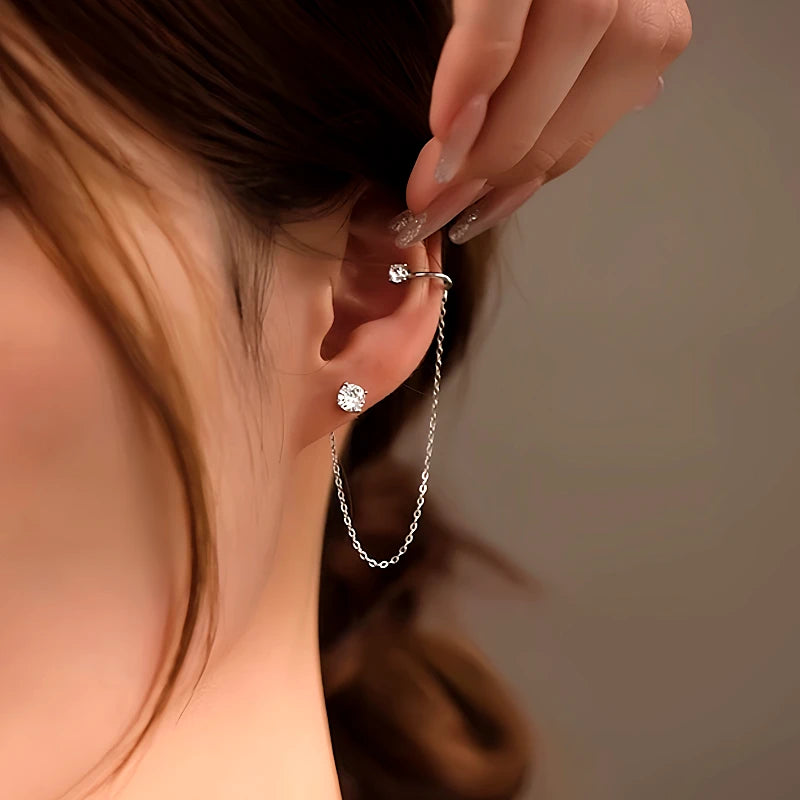 Close-up detail of the sparkling zircons and plating on the Olive Branch Earrings