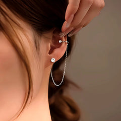 Close-up detail of the sparkling zircons and plating on the Olive Branch Earrings