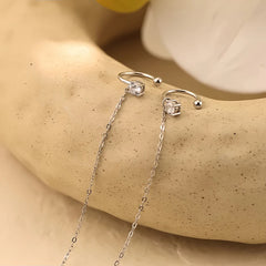 Angled view of the Sterling Silver Diamond Tassel Clip Earrings