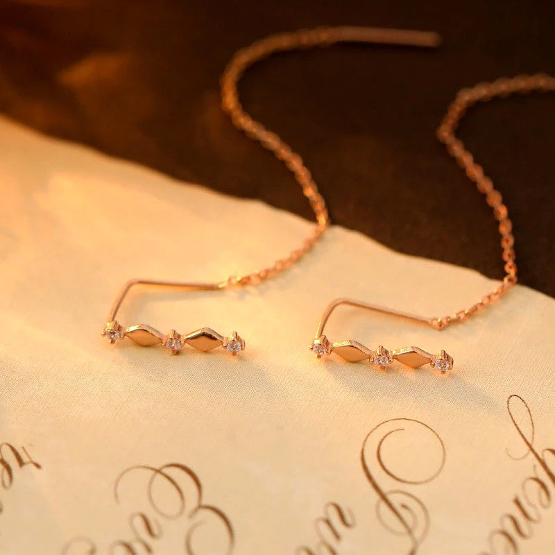 Close-up detail of the sparkling zircons and plating on the Diamond Pearl Earrings