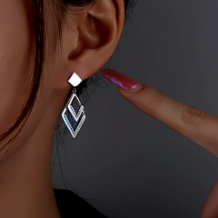 Model showcasing the dangle and style of the Sterling Silver Diamond Water Drop Earrings