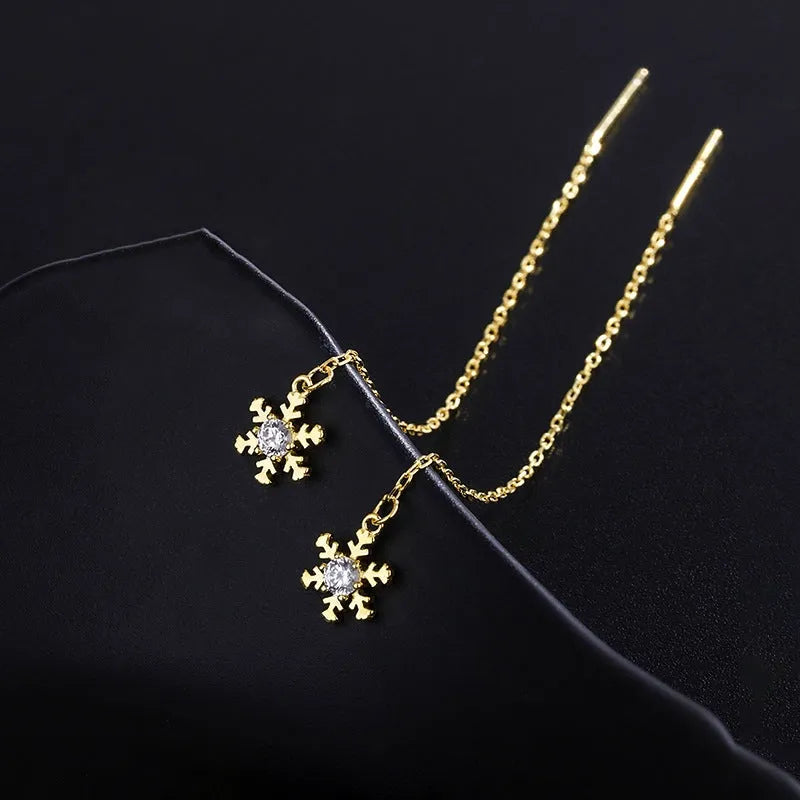 Angled view of the Sterling Silver Diamond Winter Snowflake Threader Earrings