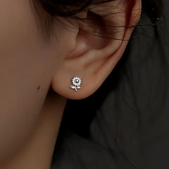 Model showcasing the dangle and style of the Sterling Silver Diasy Stud Earrings