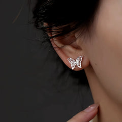 Model showcasing the dangle and style of the Sterling Silver Double-Layer Butterfly Earrings