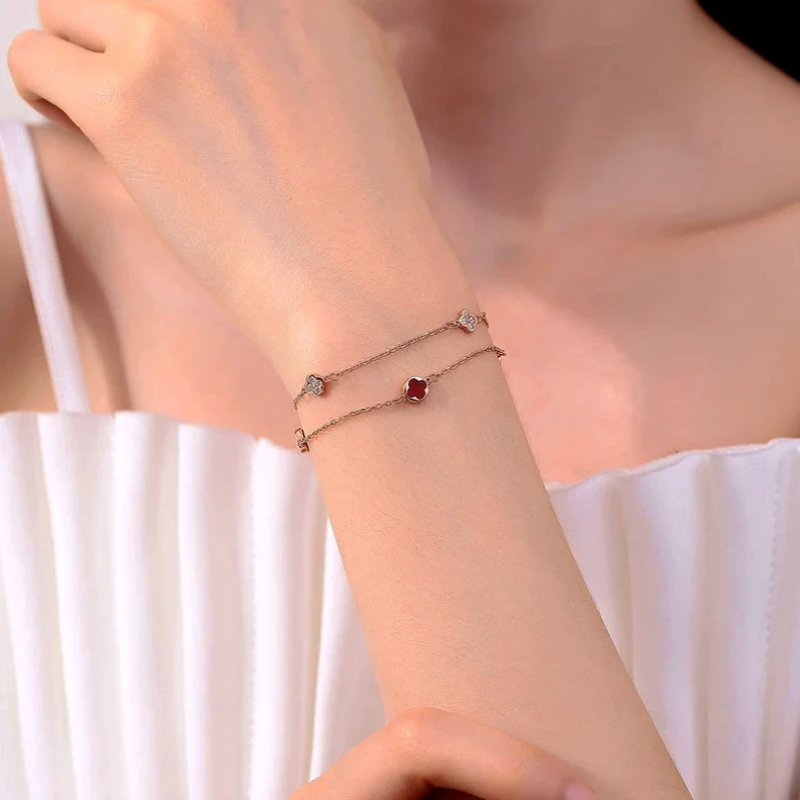 Close-up of the clasp and charm details on the Butterfly Tassel Earrings