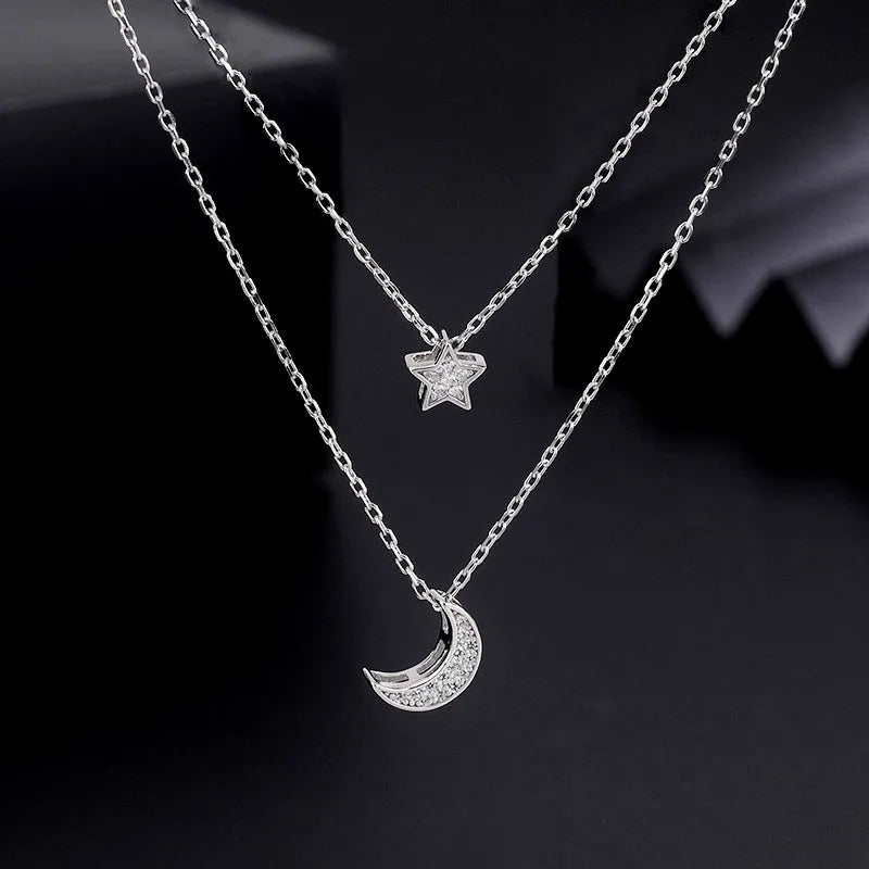 Close-up of the pendant and clasp on the Double Heart Necklace