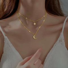 Sterling Silver Double-Layer Star Moon Necklace worn to showcase its length and pendant detail
