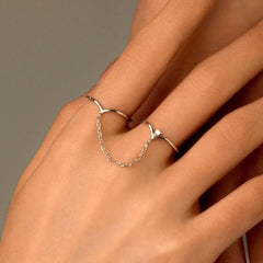 Close-up view of the gemstone and setting of the Water Drop Earrings