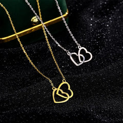 Sterling Silver Double Heart Necklaces worn to showcase its length and pendant detail