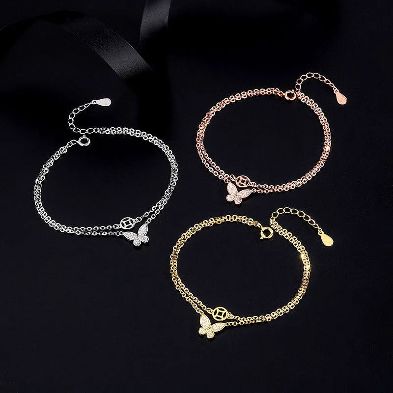 Model wearing the Sterling Silver Double Layer Butterfly Bracelets to highlight its design on the wrist