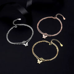 Model wearing the Sterling Silver Double Layer Butterfly Bracelets to highlight its design on the wrist