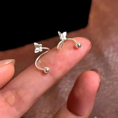 Angled view of the Sterling Silver Elegant Butterfly Earrings