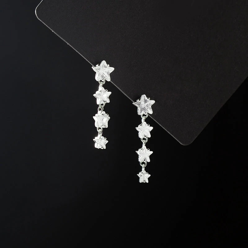 Close-up detail of the sparkling zircons and plating on the Letter H Earrings