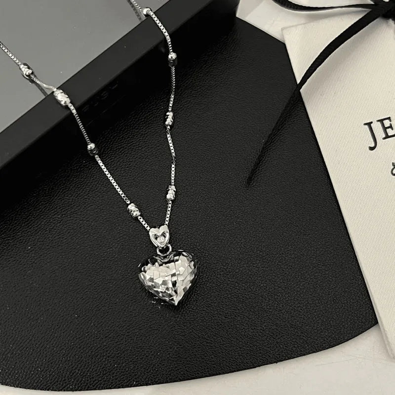 Sterling Silver Elegant Heart Necklace worn to showcase its length and pendant detail