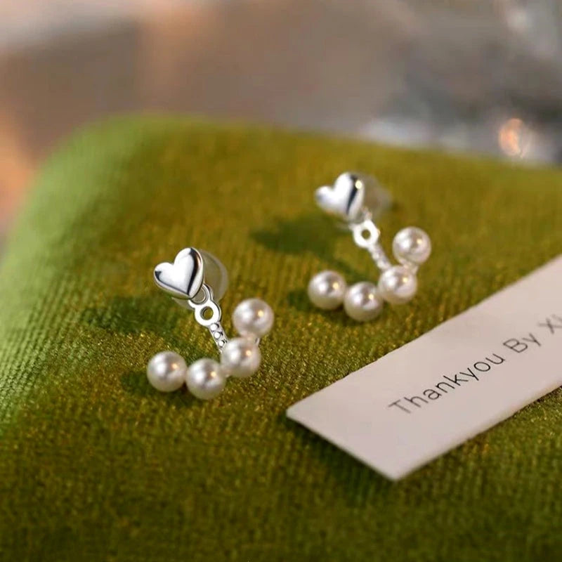 Close-up detail of the sparkling zircons and plating on the Star Tassel Earrings