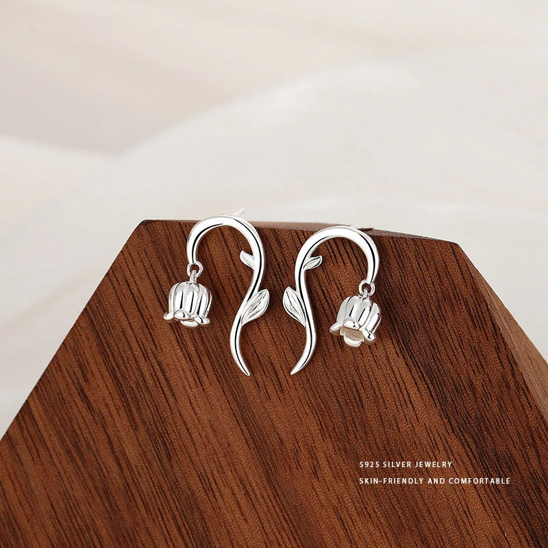 Close-up detail of the sparkling zircons and plating on the Ginkgo Leaf Earrings