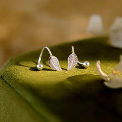 Close-up detail of the sparkling zircons and plating on the Heart Jacket Earrings
