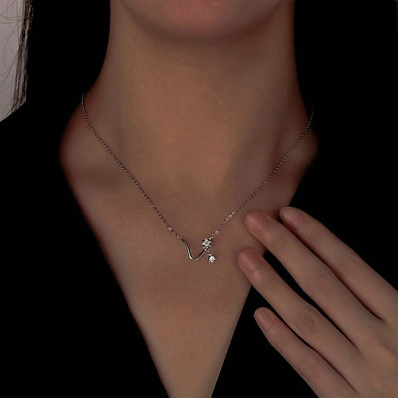 Close-up of the pendant and clasp on the Butterfly Necklace