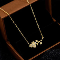 Sterling Silver Flower Branch Girl Necklace worn to showcase its length and pendant detail