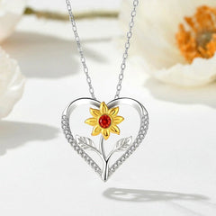 Close-up of the pendant and clasp on the Flower Heart Necklace