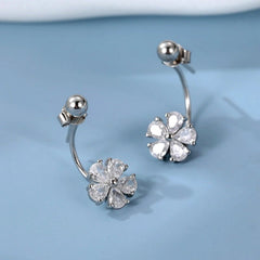 Model showcasing the dangle and style of the Sterling Silver Flower Jacket Earrings