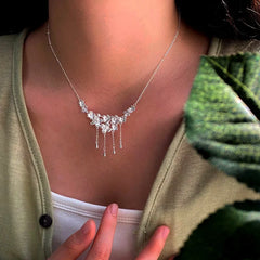 Sterling Silver Flower Water Drop Tassel Necklace worn to showcase its length and pendant detail