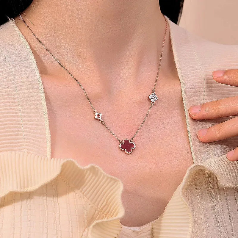 Sterling Silver Four-Leaf Clover Agate Necklaces worn to showcase its length and pendant detail