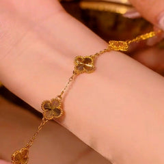 Model wearing the Sterling Silver Four-Leaf Clover Bracelet to highlight its design on the wrist